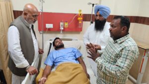 AAP Punjab Media Head Baltej Pannu meets injured anti-drug crusader at Ludhiana on Wednesday